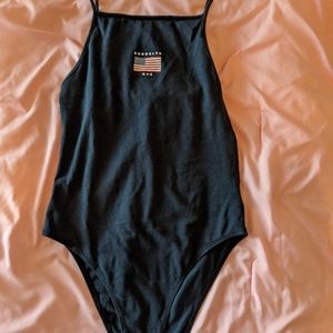 Blue onesie shirt. Brooklyn nyc with american flag